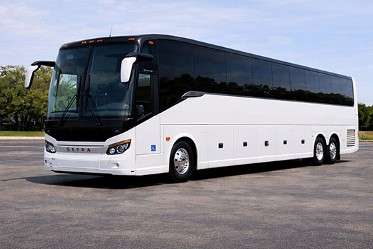 56-passenger charter bus rental Los Alamos TX